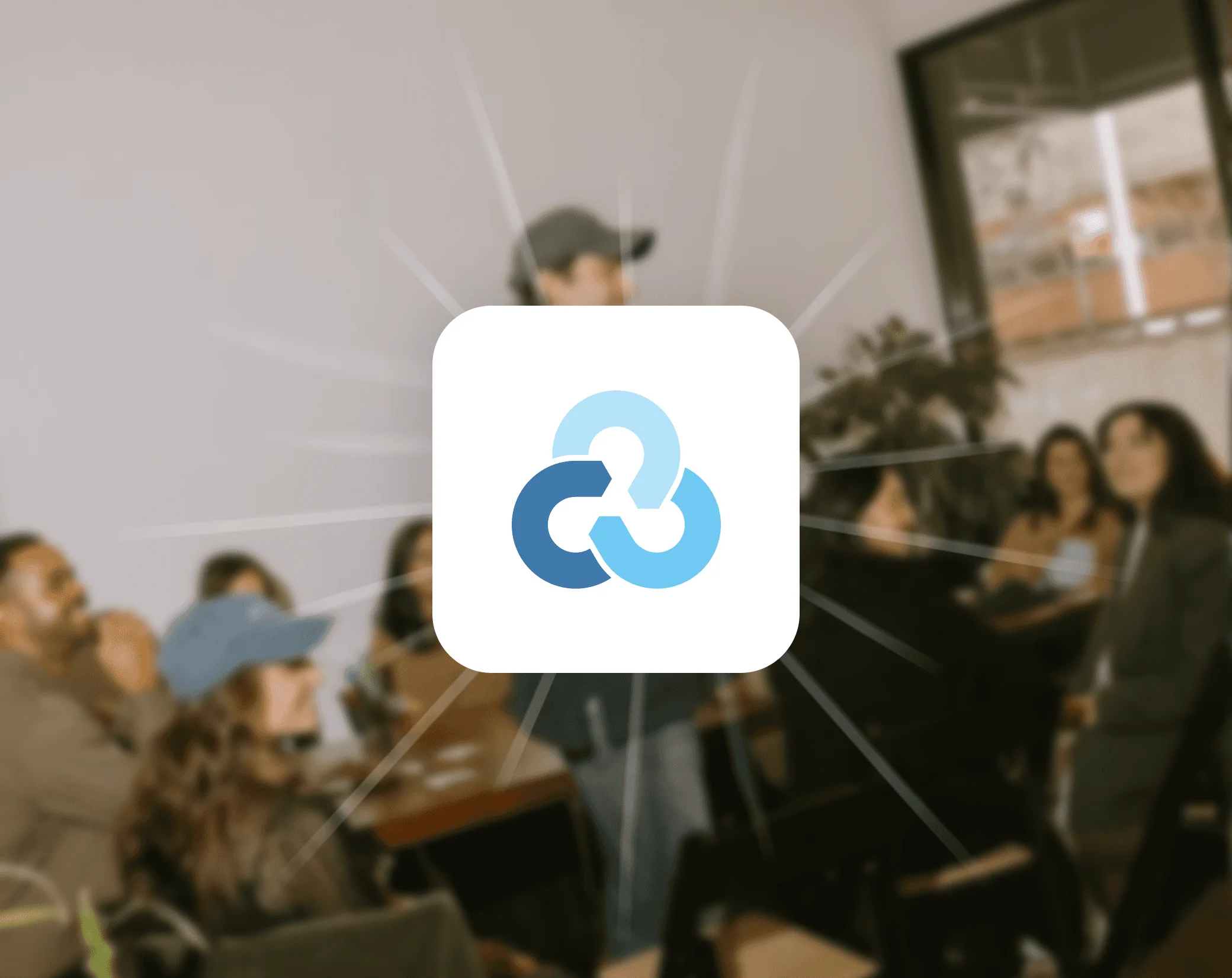 Logo Rclone sur la photo d’un groupe de personnes dans une salle