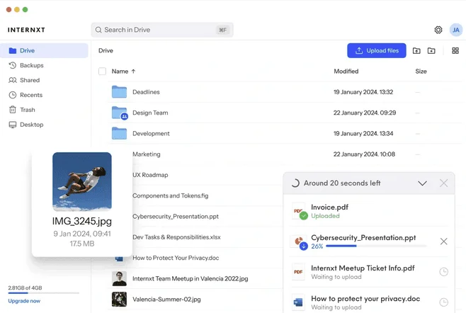 Internxt Drive web app listing folders and files, with uploads in progress