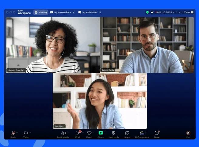 Zoom Workplace meeting with three participants and a toolbar with chat, share and AI Companion