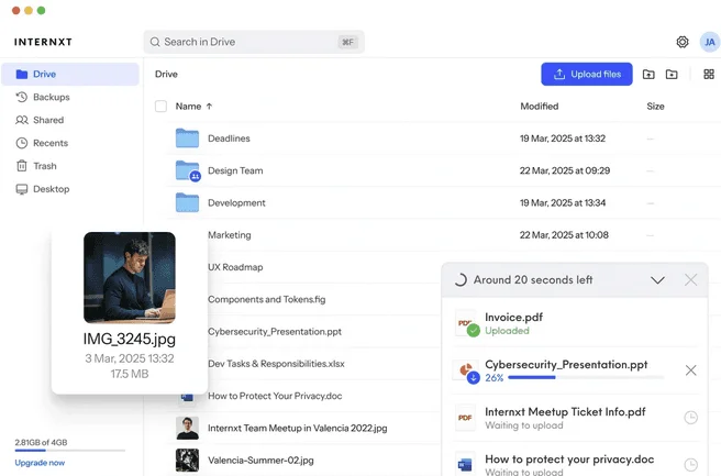 Internxt Drive web app listing folders and files, with uploads in progress